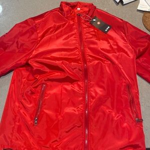 Red rain jacket in size XXXL